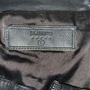 A black BlankNYC leather jacket